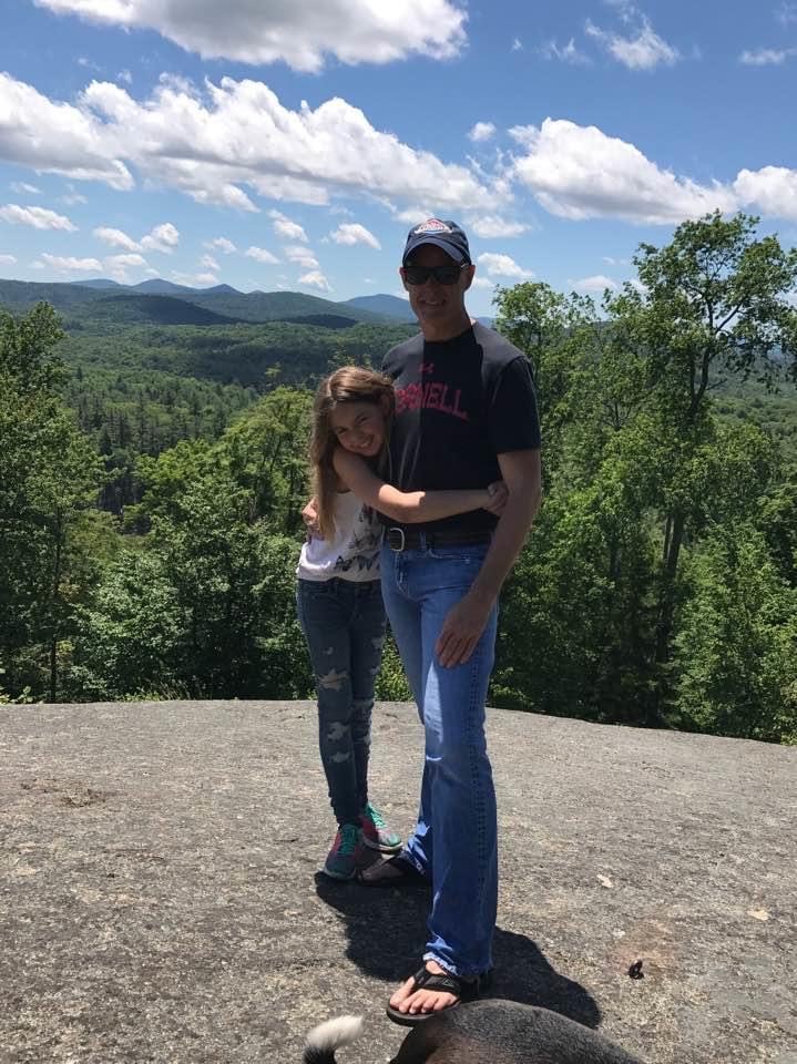 Hiking with his daughter